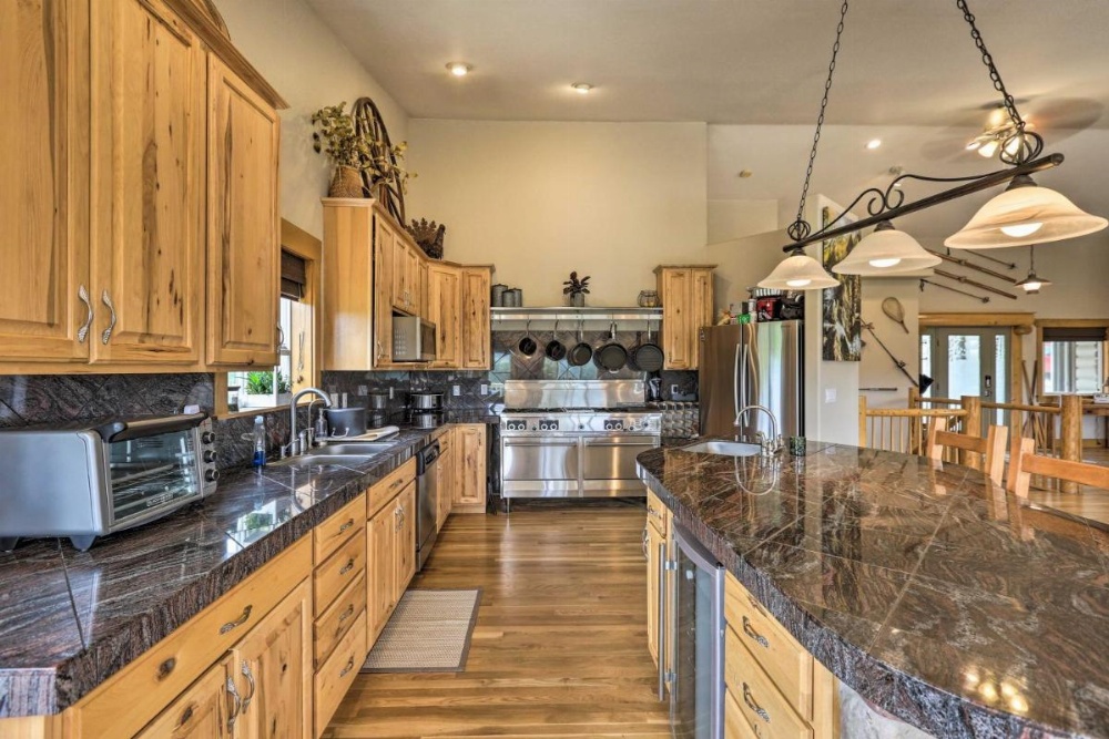 Upscale Mountain-View Manor with Deluxe Deck! Image 11